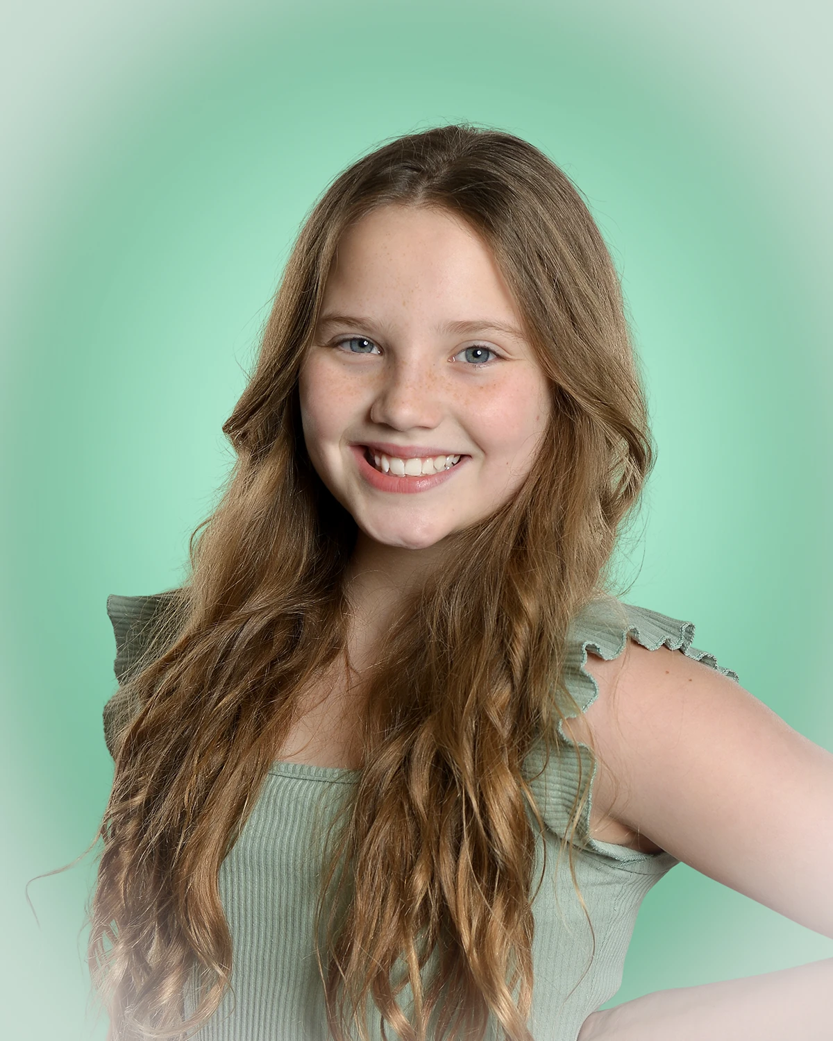 Portrait of girl on green background